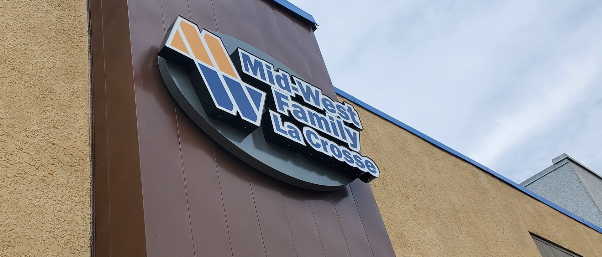 Mid-West Family La Crosse building logo